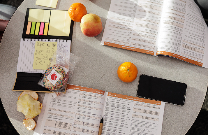 An image of two Program notebooks on a table