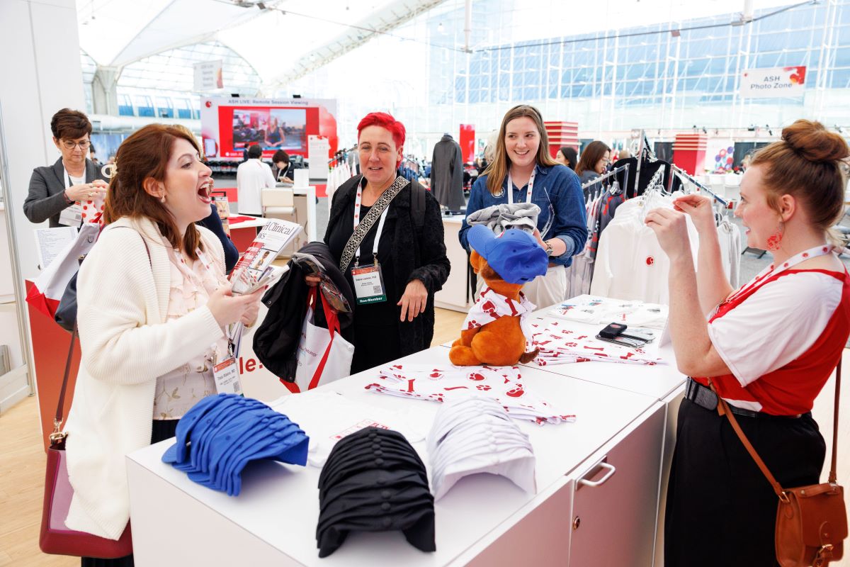 attendees browse ASH gear