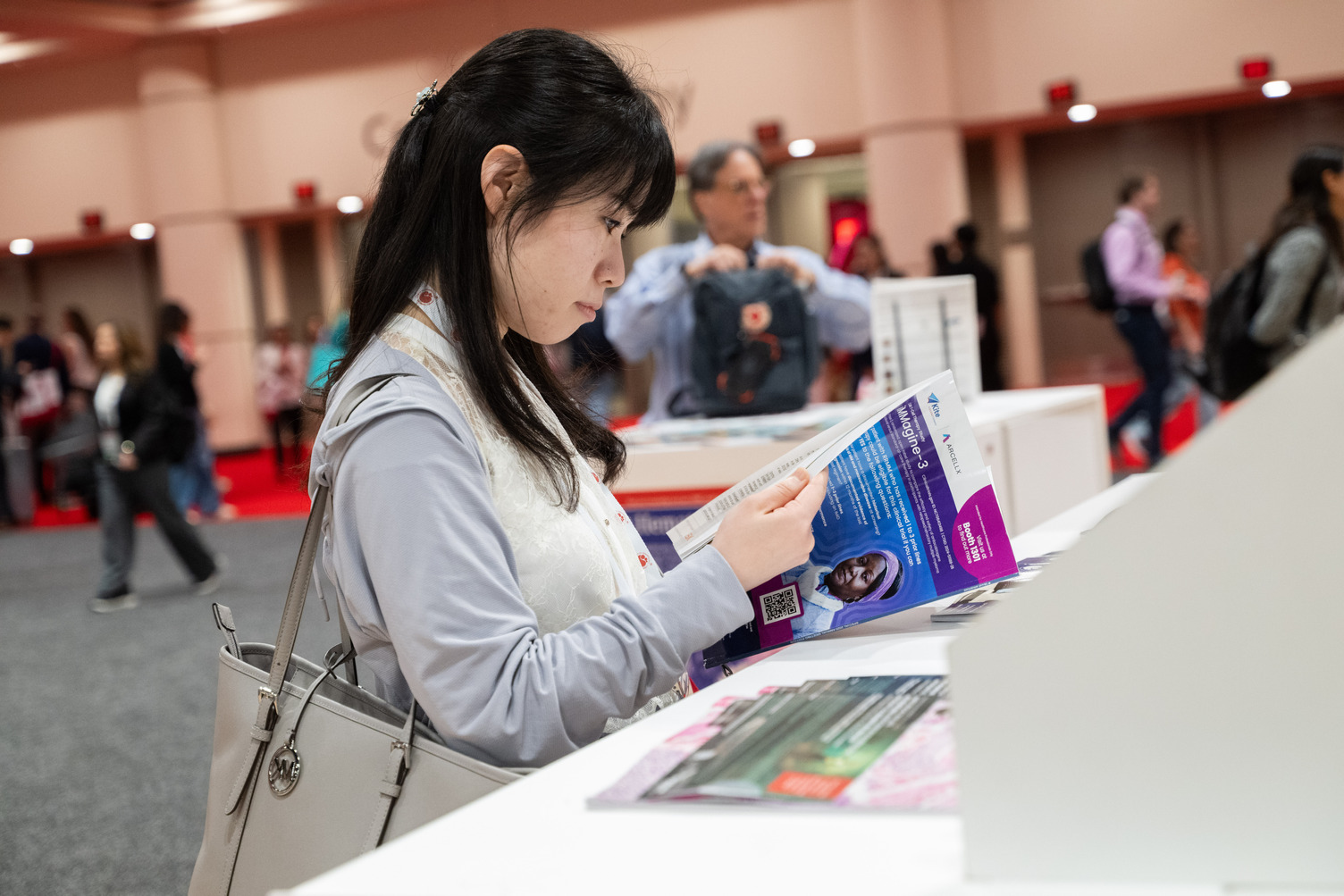 woman observing a pamphlet