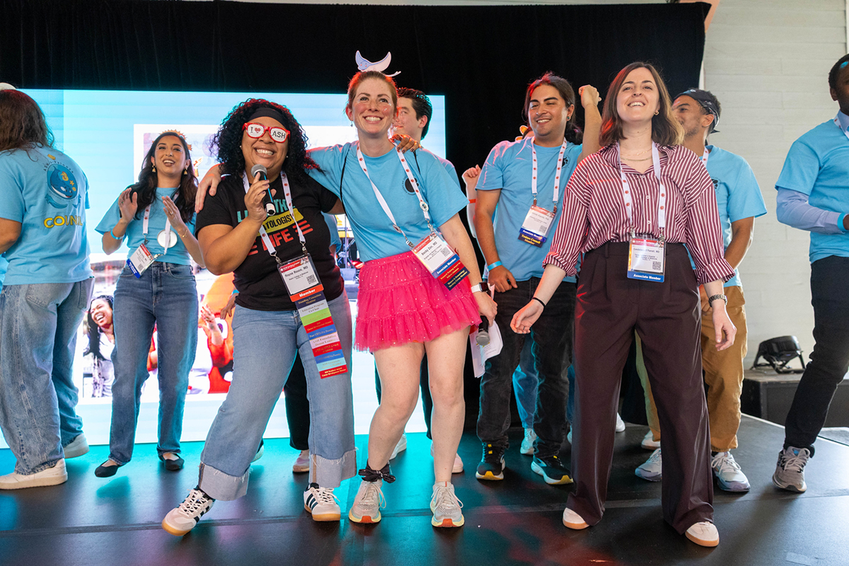 A group of attendees on the stage during the ASH-a-Palooza event of the Annual Meeting 