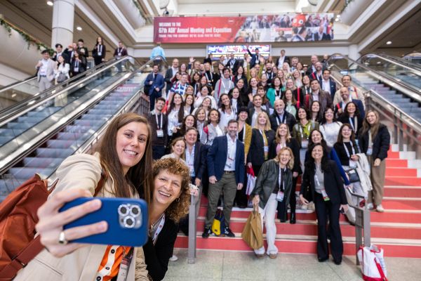 A group takes a selfie at the annual meeting