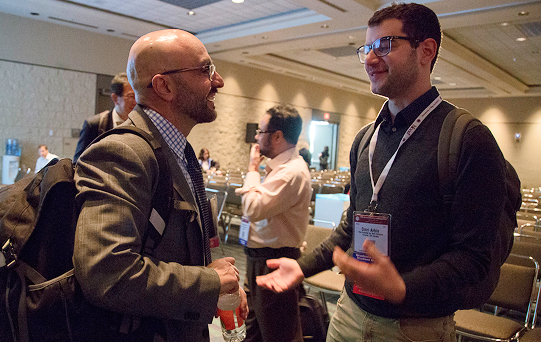 Jorge Di Paola, MD, (left) of Washington University in St. Louis, winner of the 2025 ASH Mentor Award in Basic Science, speaks with an ASH graduate student member at the annual meeting.